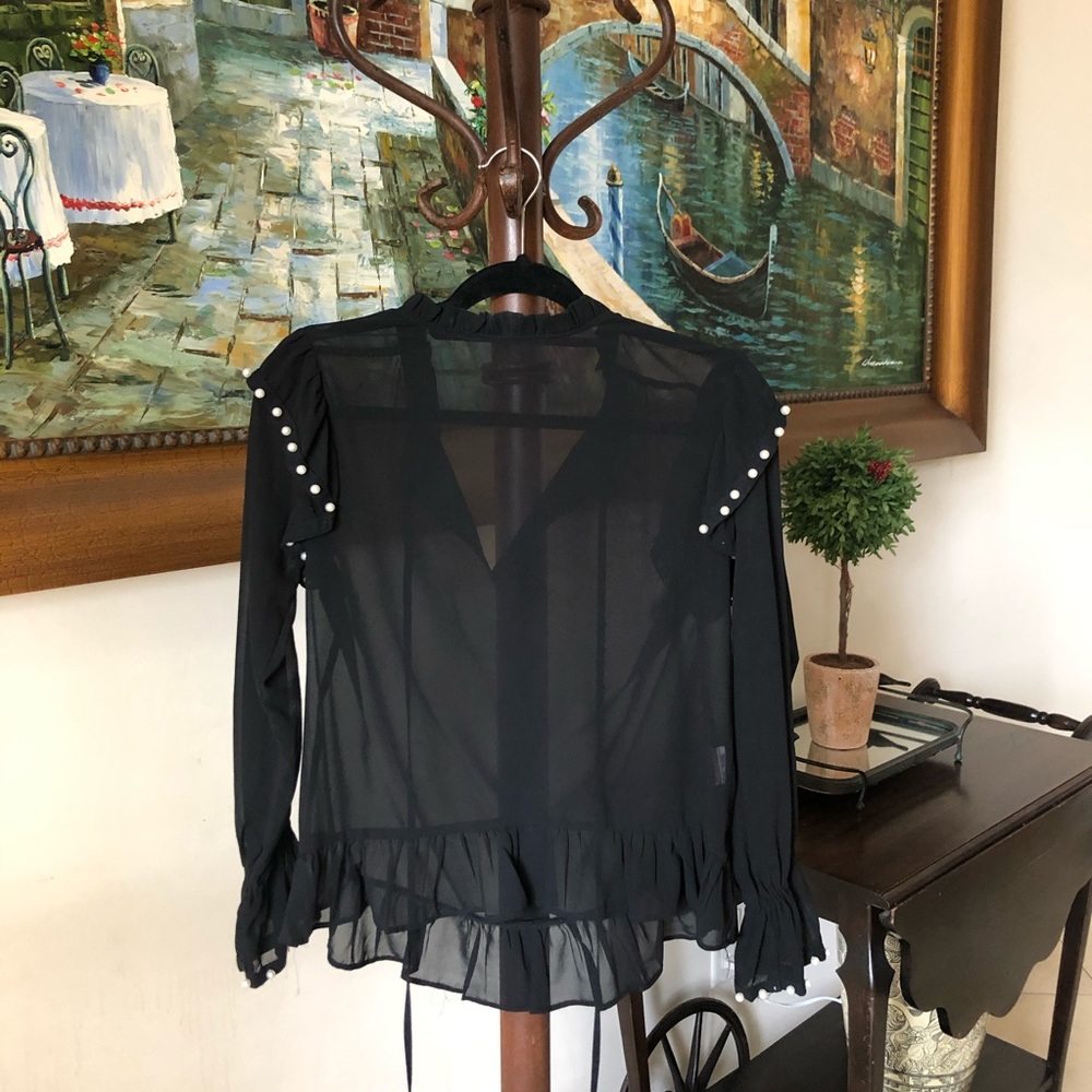 See through black shirt
